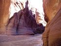 Sunshine catches the upper parts of the narrow canyon walls.